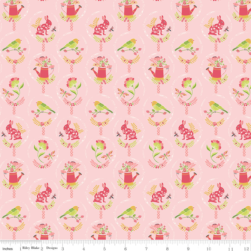 Awakening Spring Charms Pink by Riley Blake - bunnies birds watering cans and spring icons in oval medallions on pink cotton fabric
