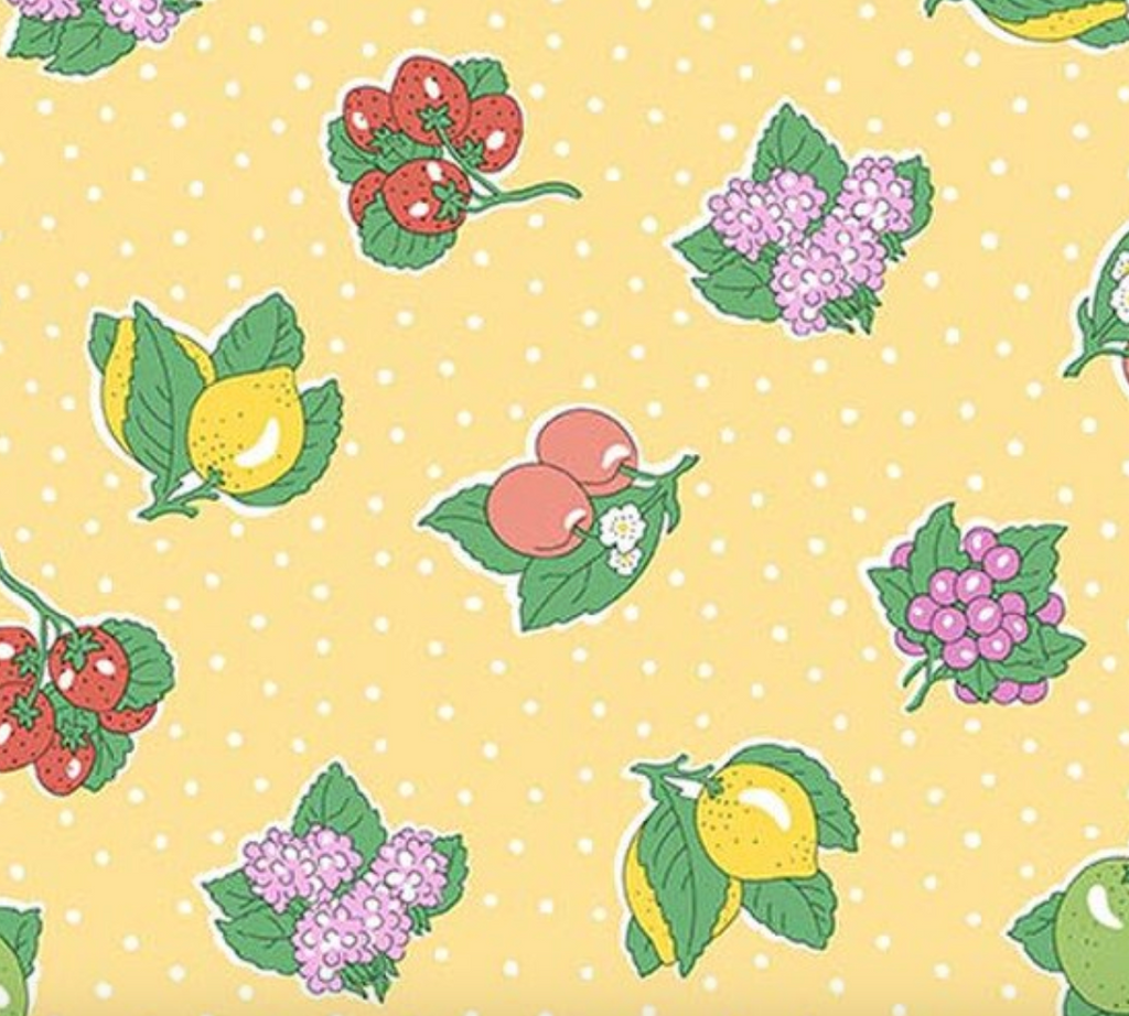 Liberty Gifts from the Garden Polka Fruit A - close up of fruit print on yellow polka dot ground