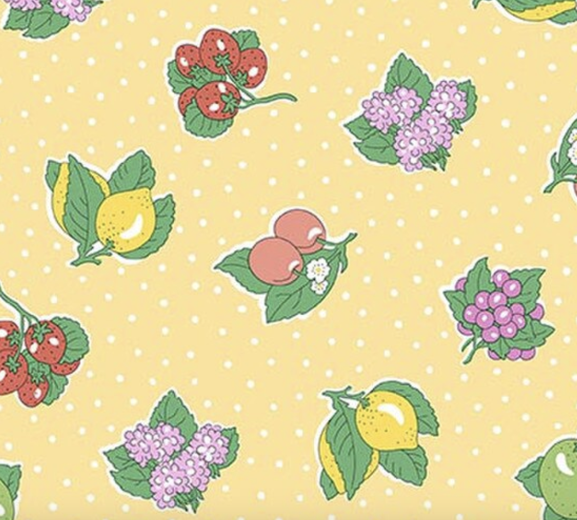 Liberty Gifts from the Garden Polka Fruit A - close up of fruit print on yellow polka dot ground